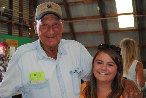 McVay and Evenson smile for a photo at the fair. 
